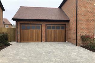 Hormann garage light doors finished in Light oak