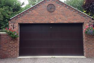 Double Bamford sectional door finnished in Rosewood